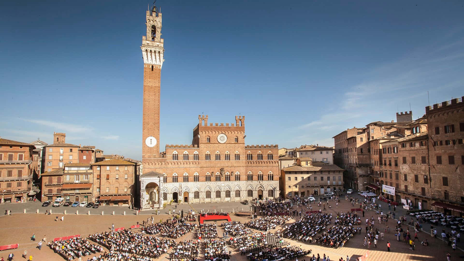 Siena Piazza Del Campo With Tourists Background