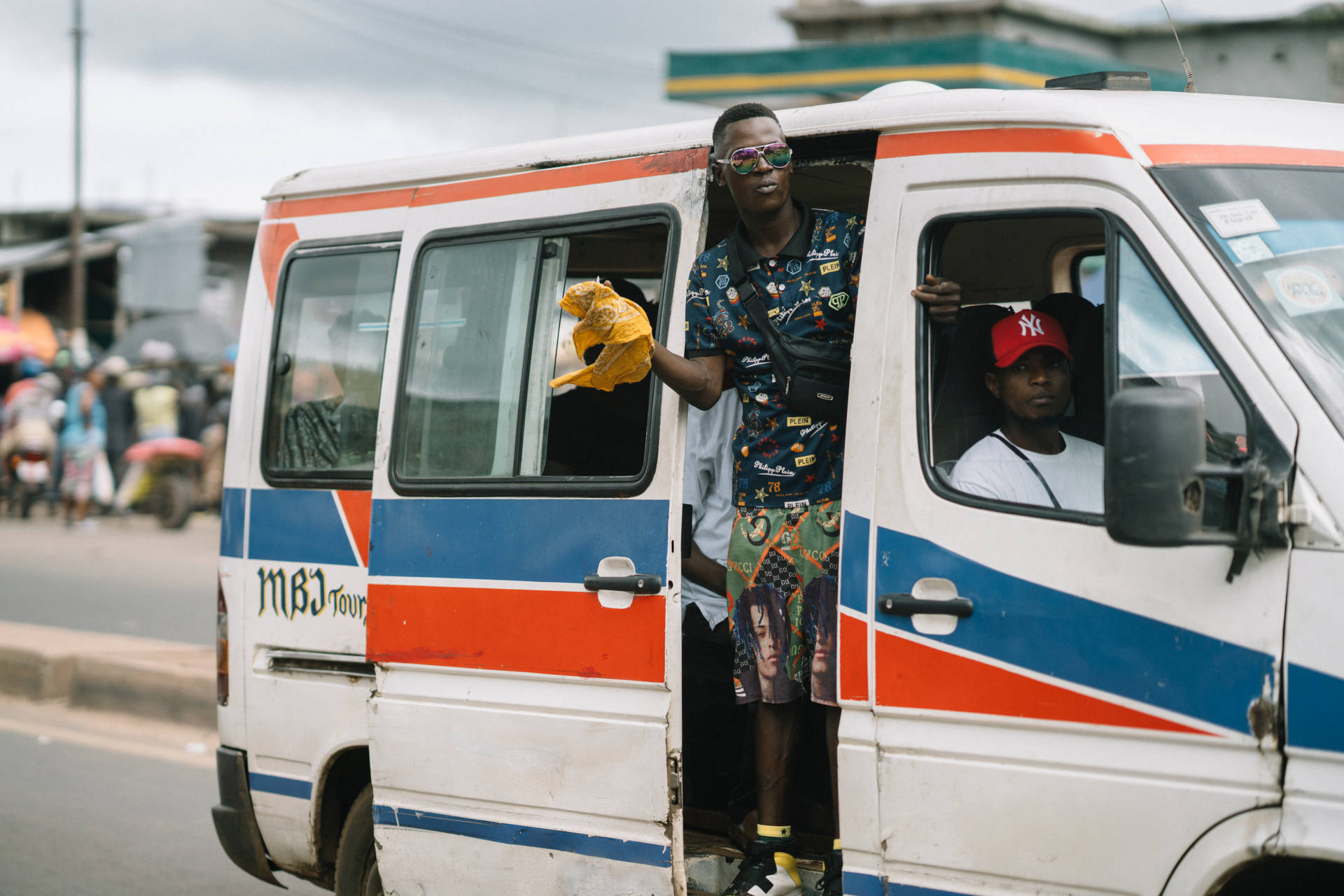 Sierra Leone Men In Colorful Van