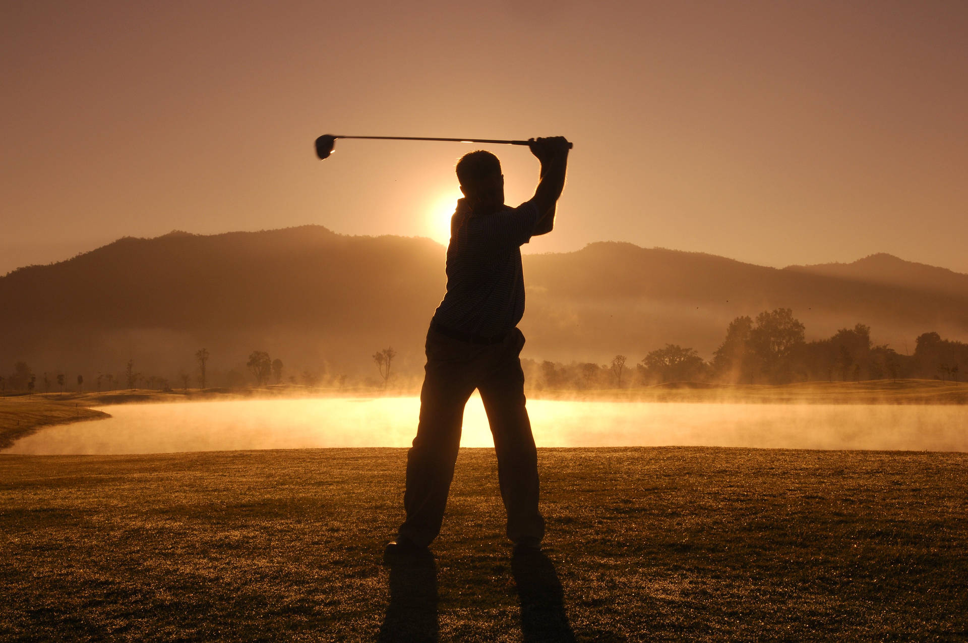 Silhouette Man Golfing Desktop Background