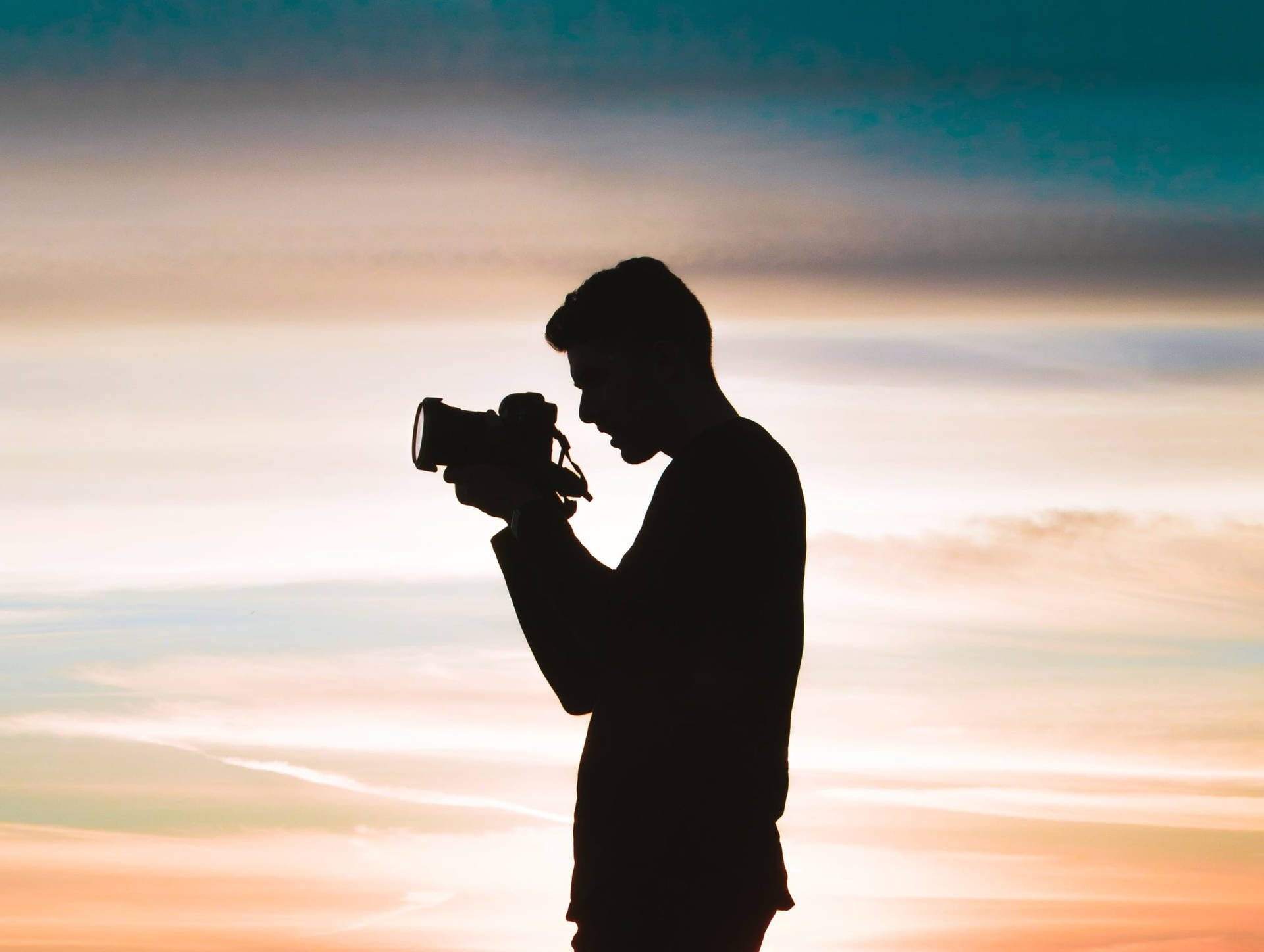 Silhouette Man With Camera Background