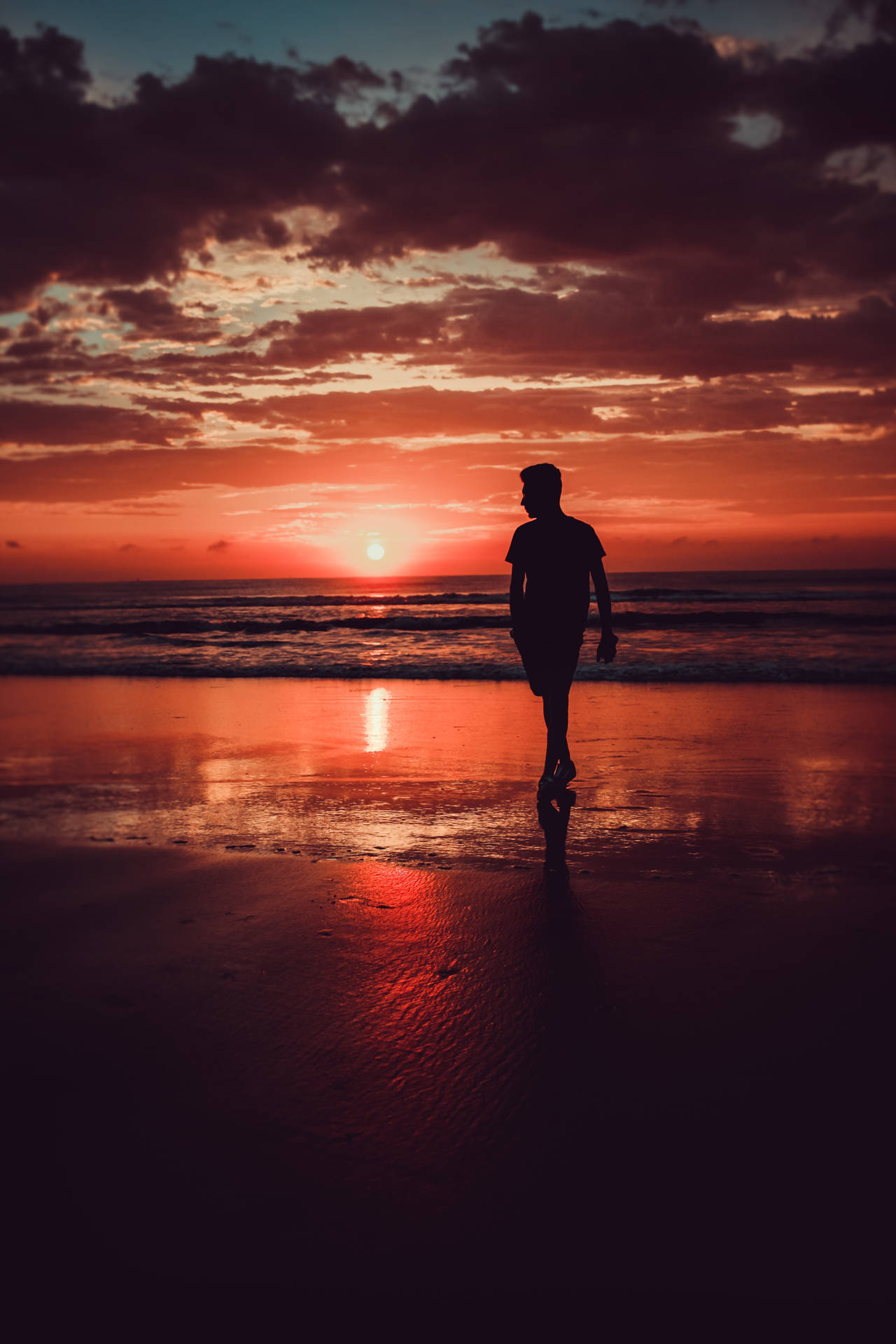Silhouette Man With Red Sky Background