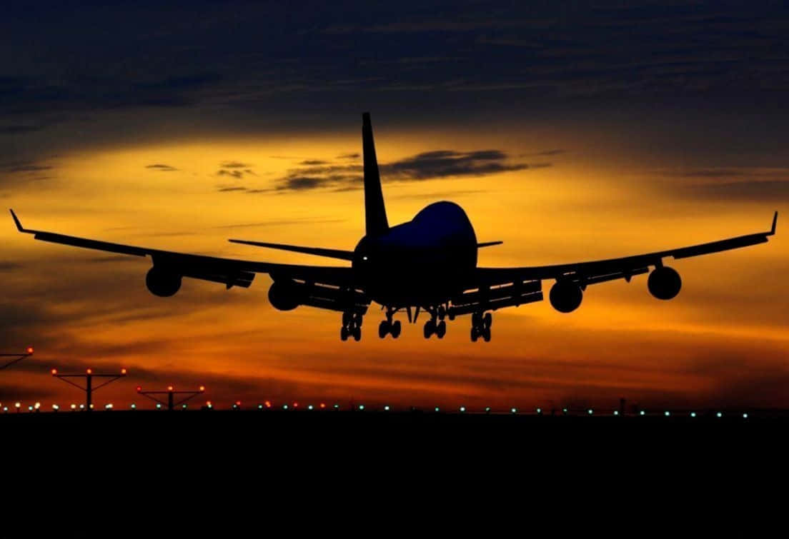 Silhouette Of 747 Airplane Background