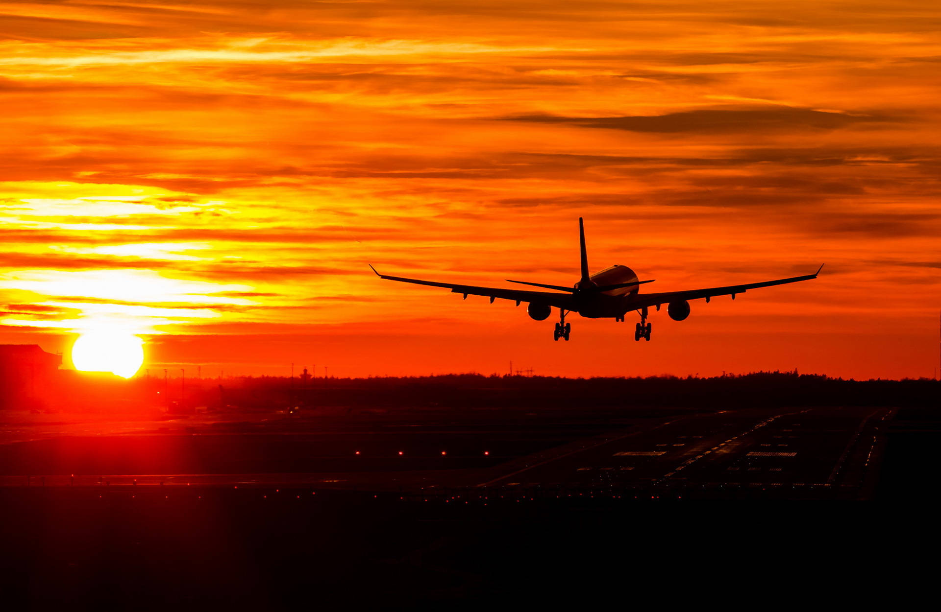 Silhouette Of Finnair Aircraft At Sunset