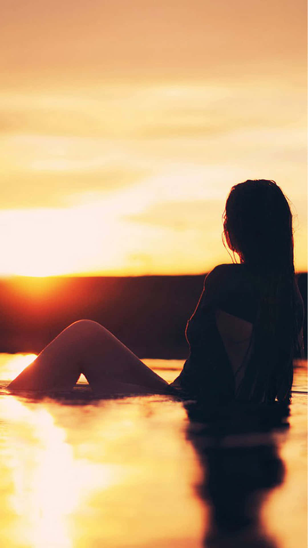 Silhouette Of Girl On Beach's Golden Sunset