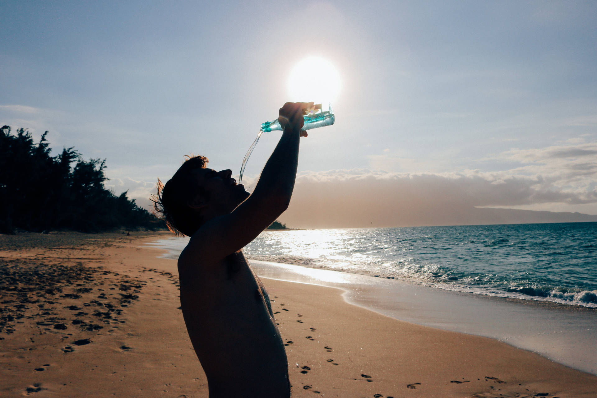 Silhouette Of Man Drinking Water Background