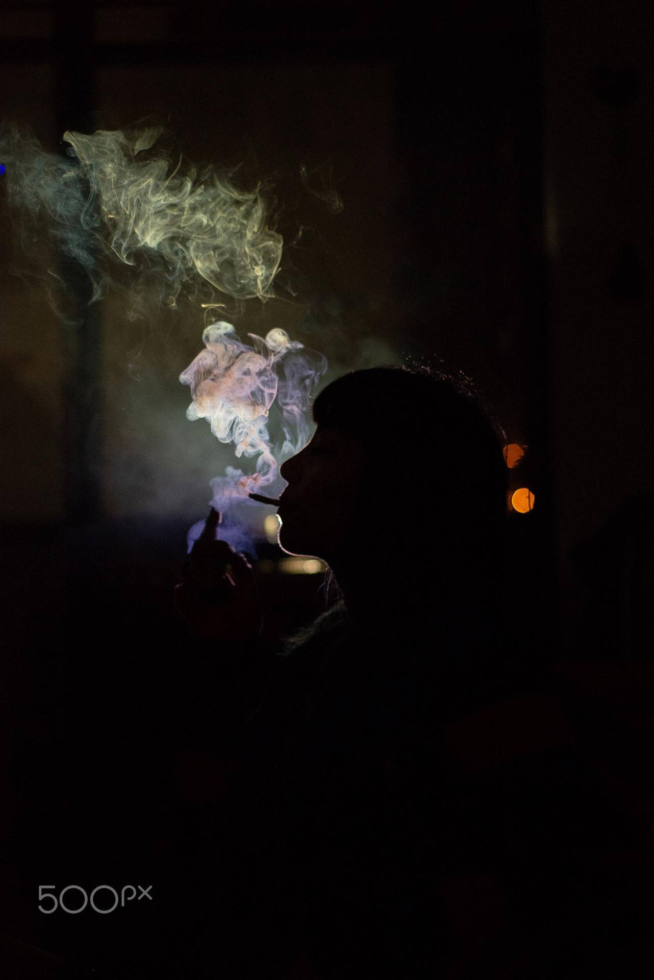 Silhouette Of Woman Smoking Blunt