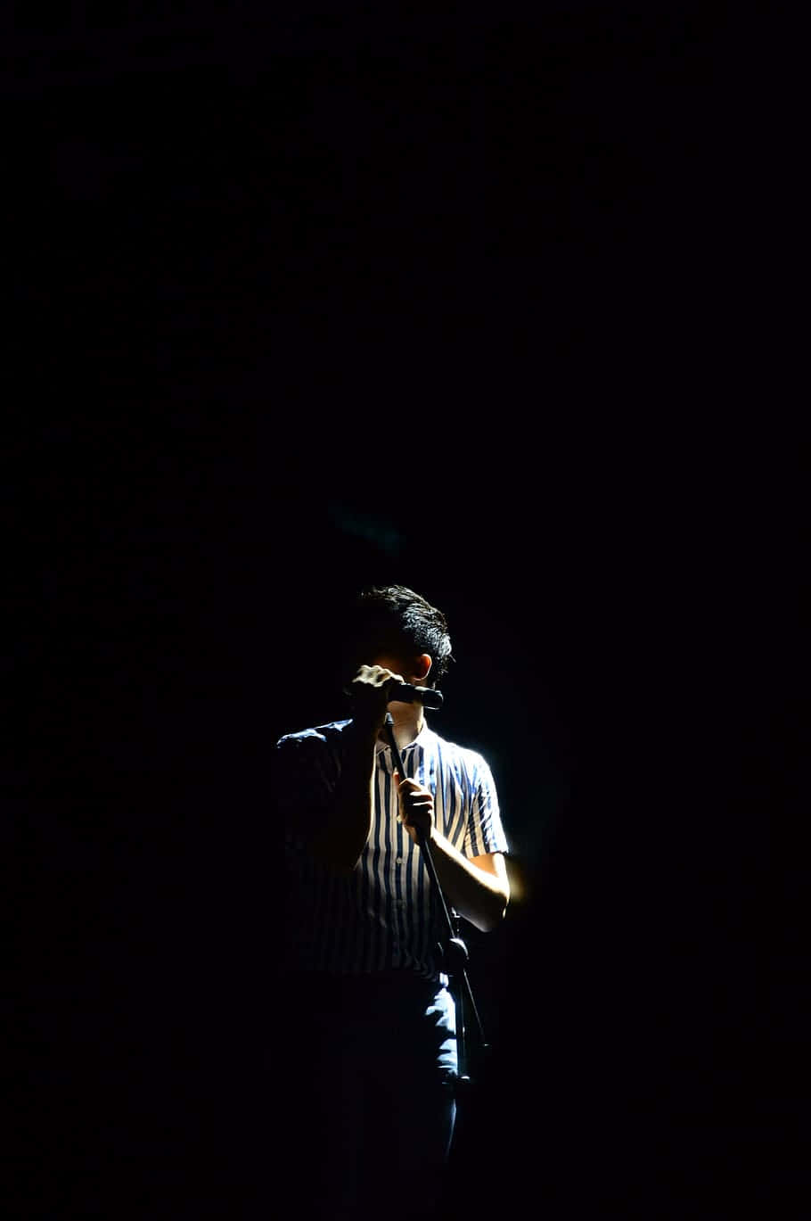 Silhouetted Boy Singing - A Moment In Portrait Photography Background