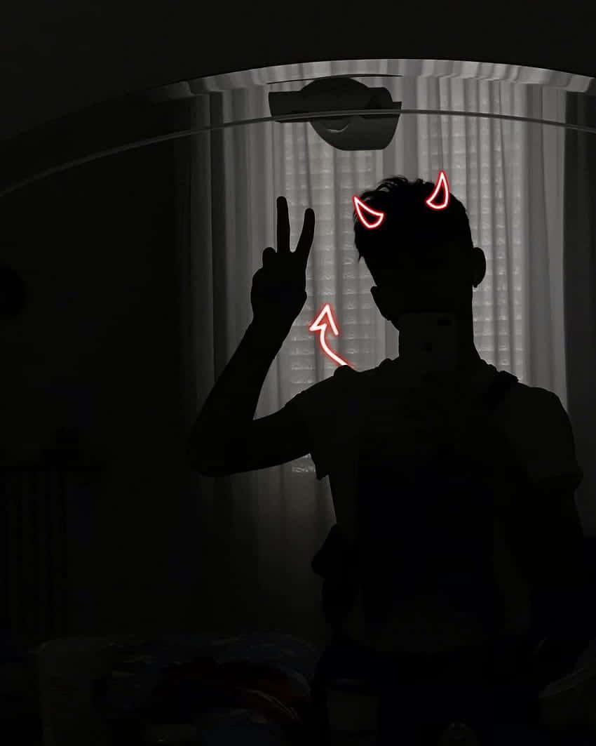 Silhouetted Demon Peace Sign Background