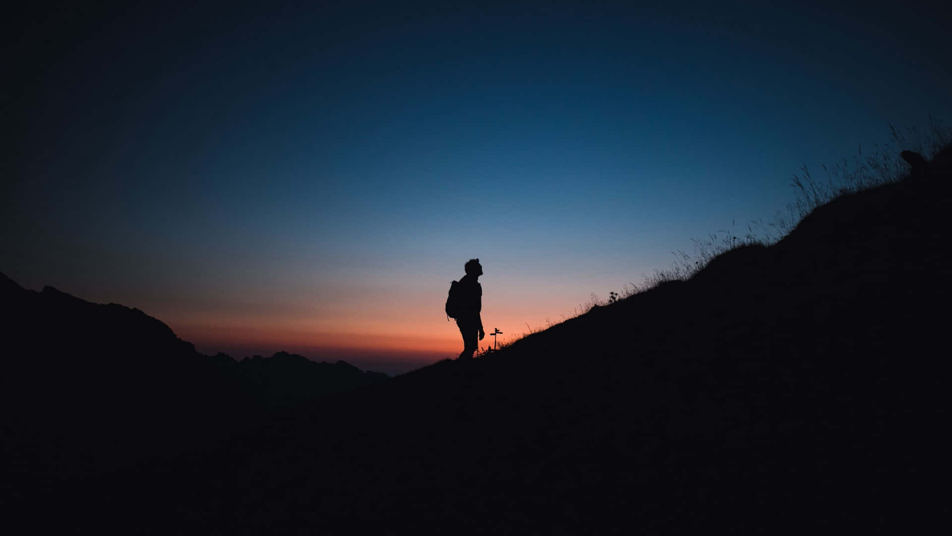 Silhouetteof Hikerat Dusk.jpg Background