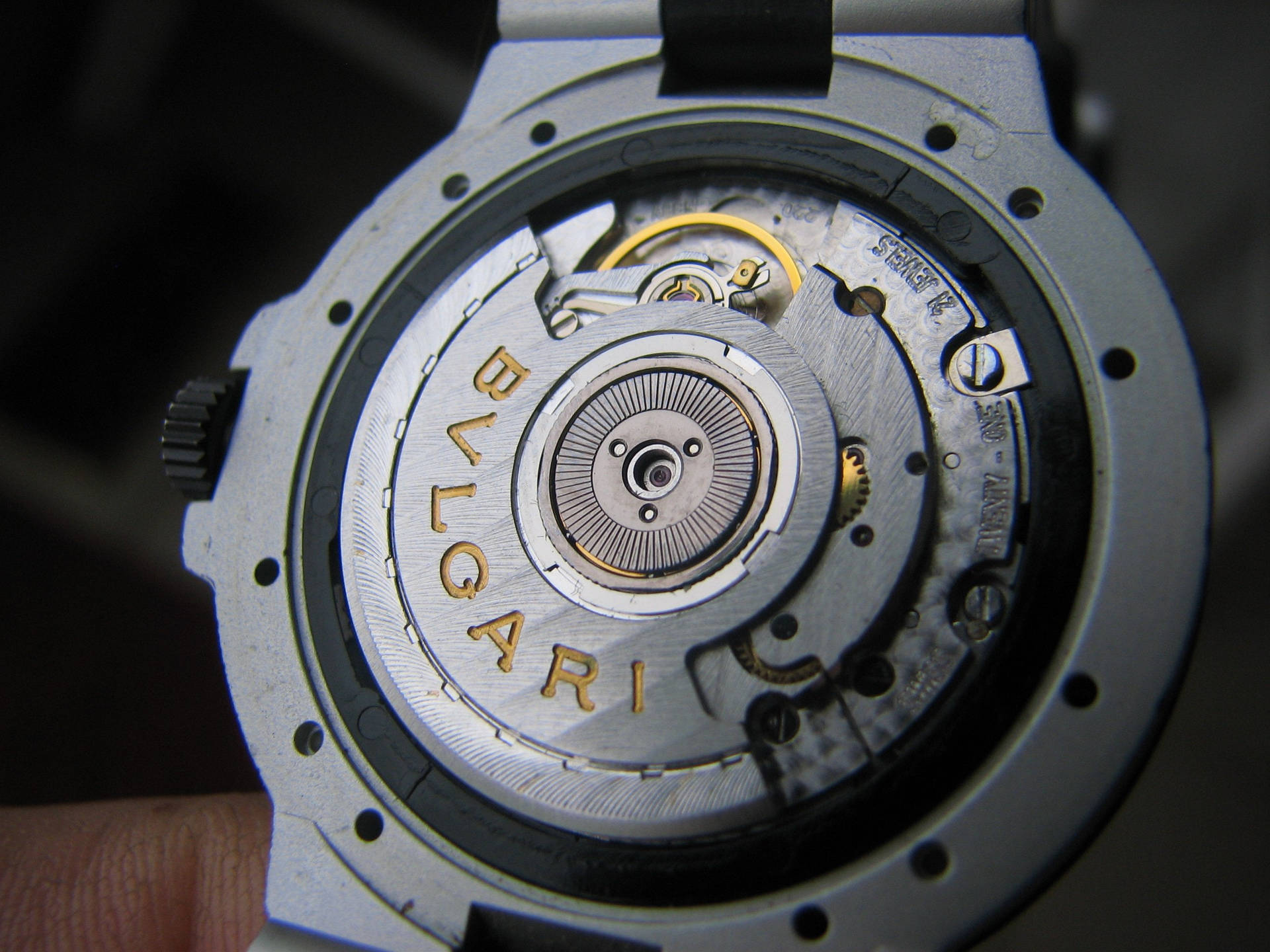 Silver Bvlgari Watch Movement Background