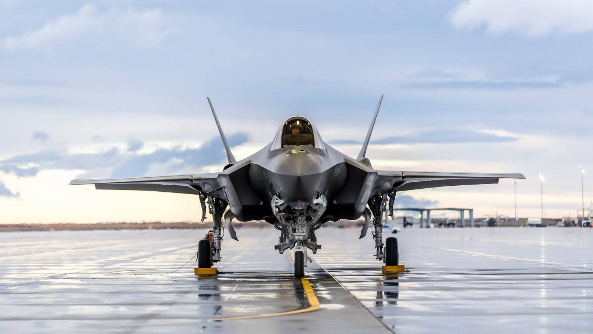 Silver Jet Fighter On Runway