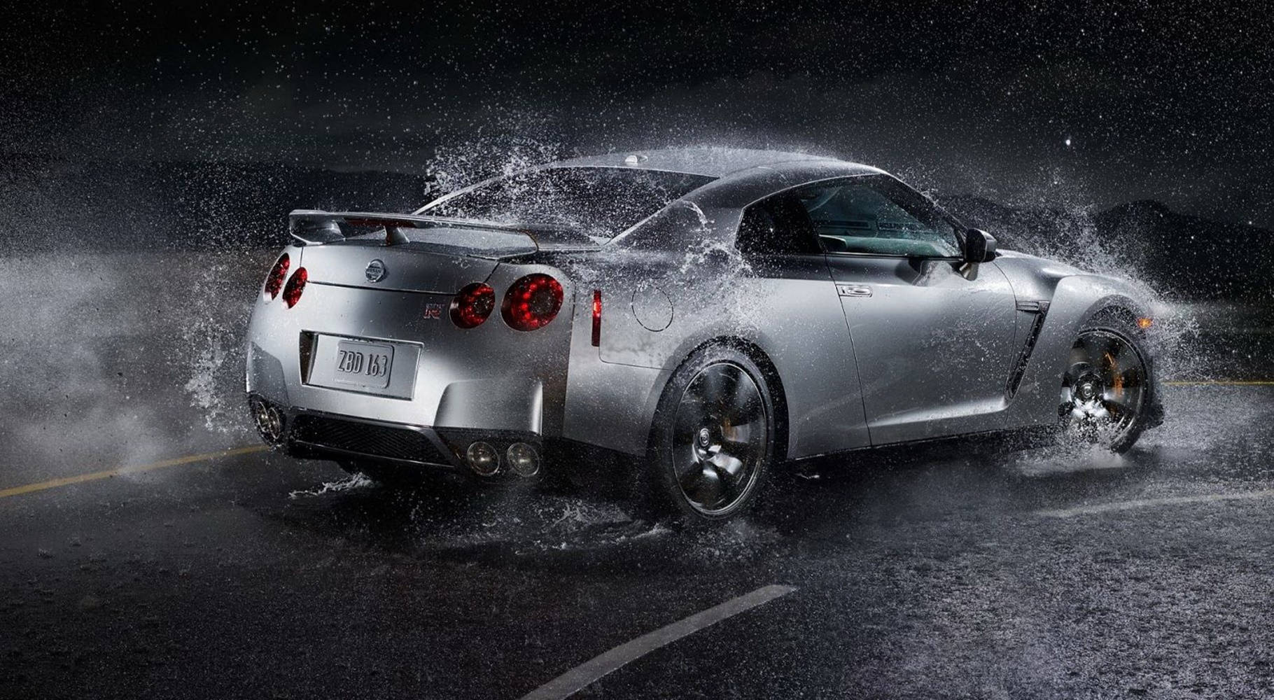 Silver Nissan Gtr With Water Splash Background