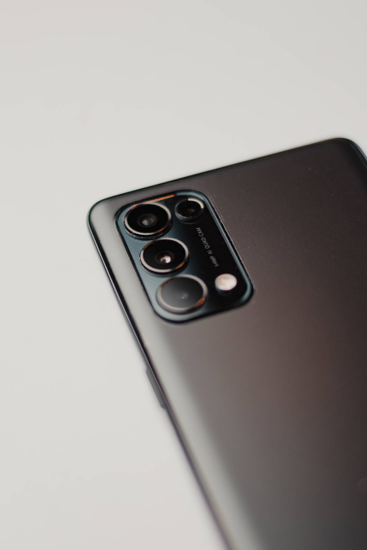 Silver Oppo Phone Camera Lenses Background