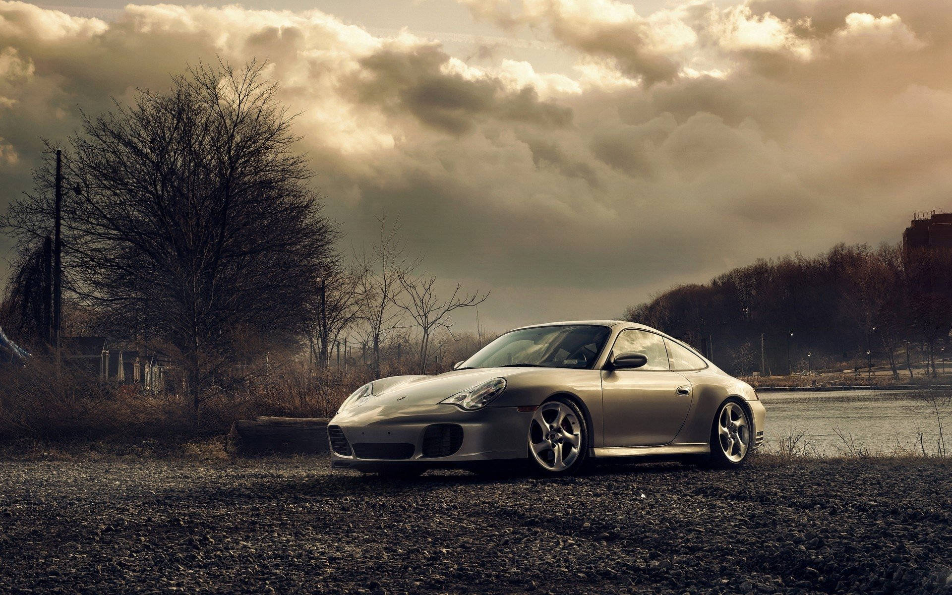 Silver Porsche 911 By The River Background