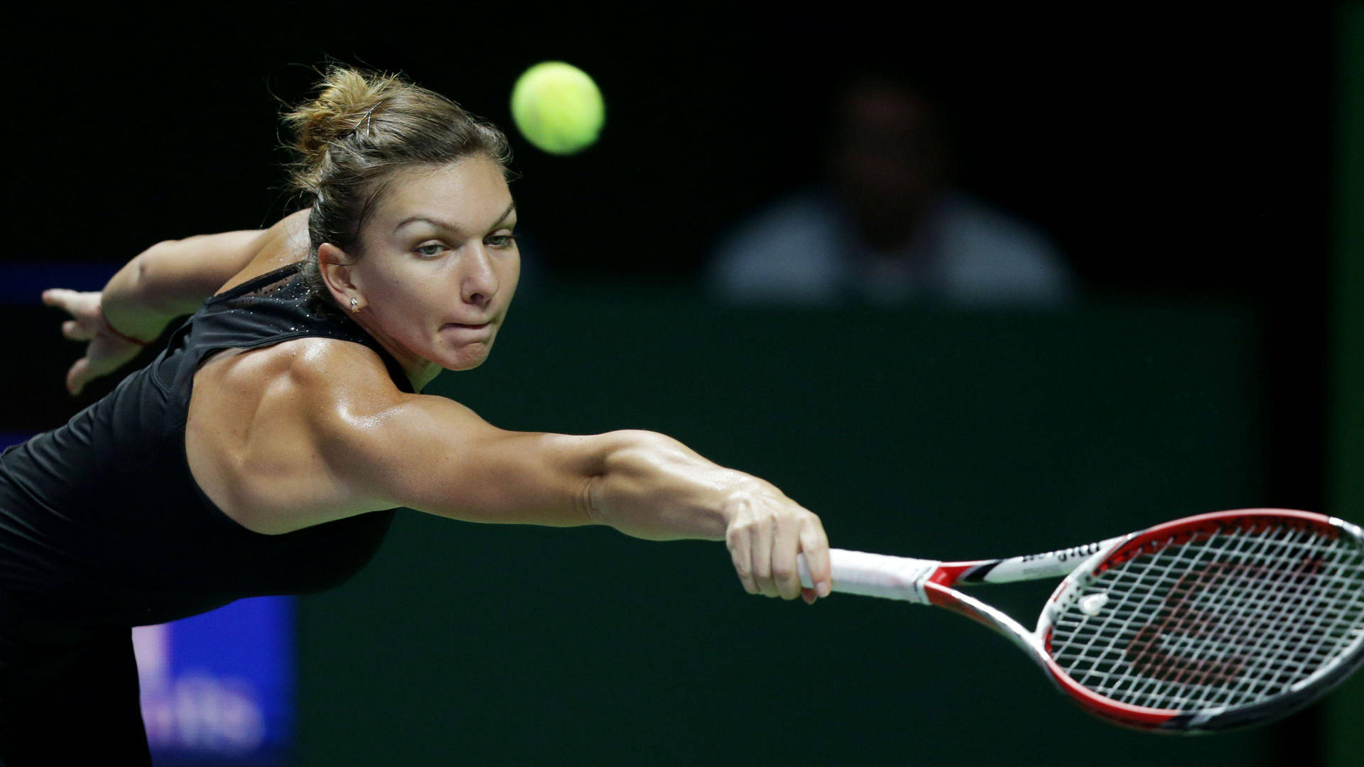 Simona Halep Fully Focused In The Tennis Court Background