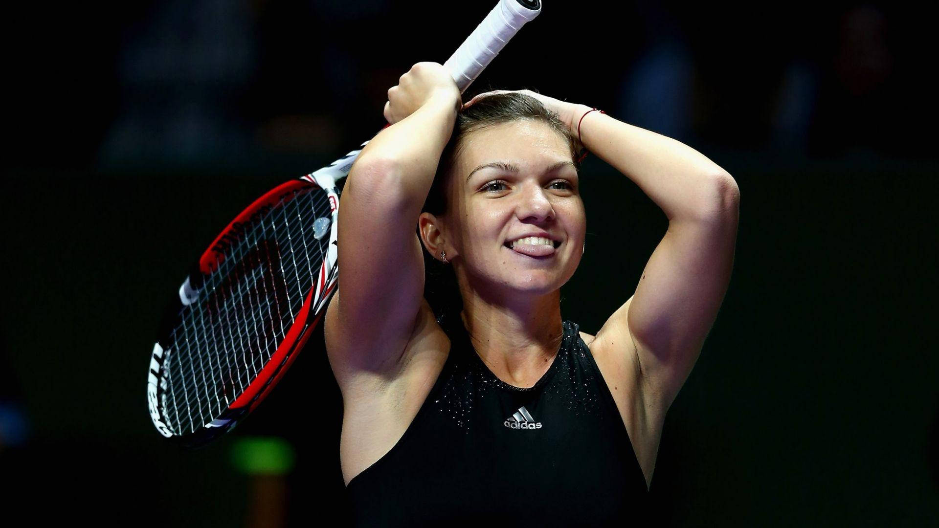 Simona Halep Hands Over Head