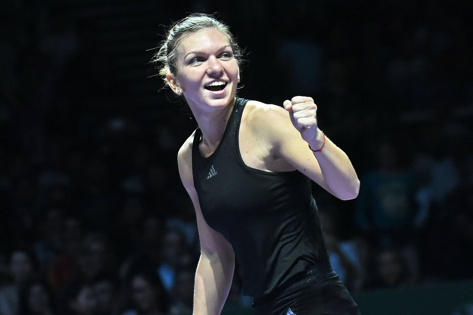 Simona Halep In Black Sportswear Background