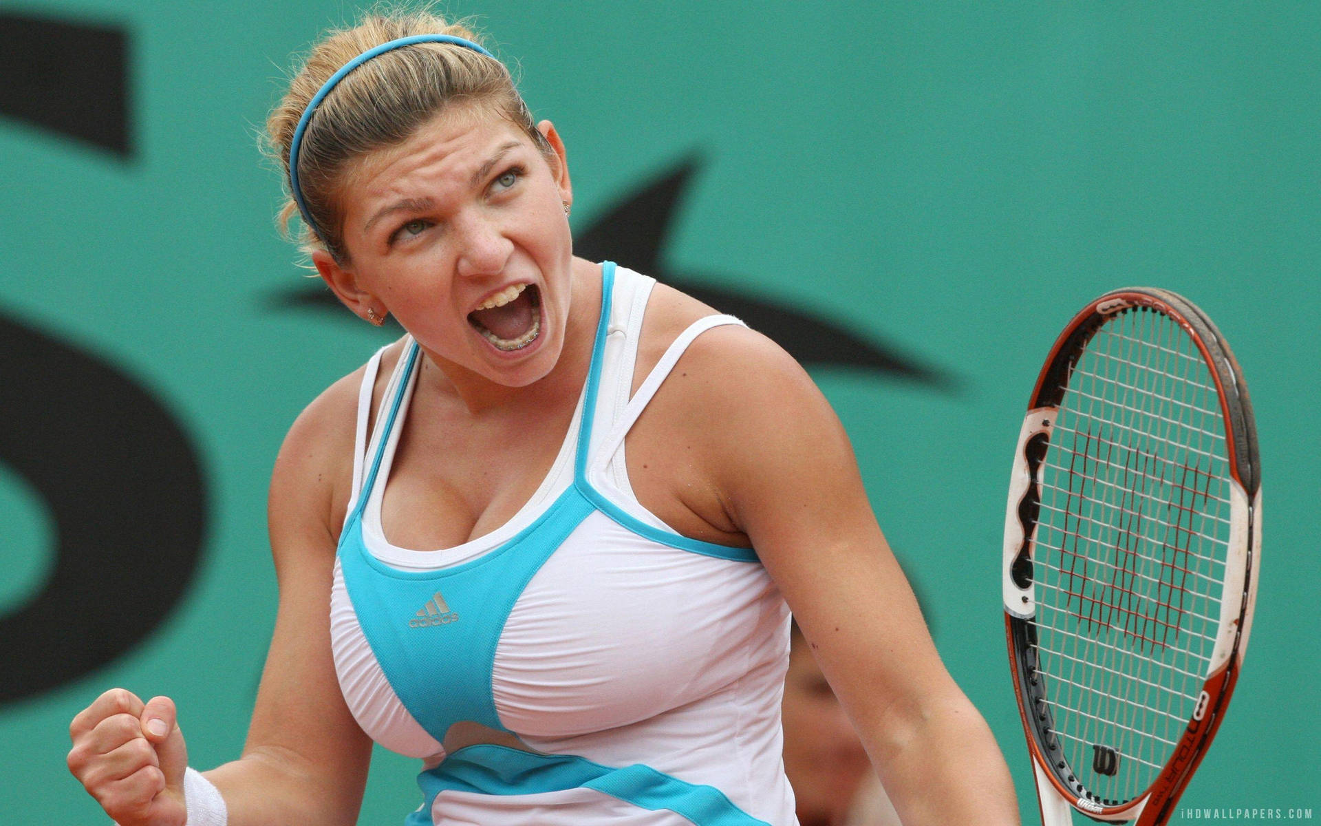 Simona Halep Mastering A Forehand Stroke On Court