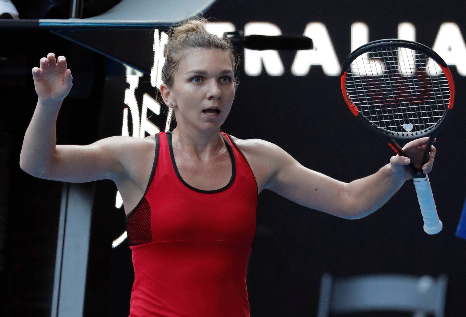 Simona Halep: Tennis Champion In Action