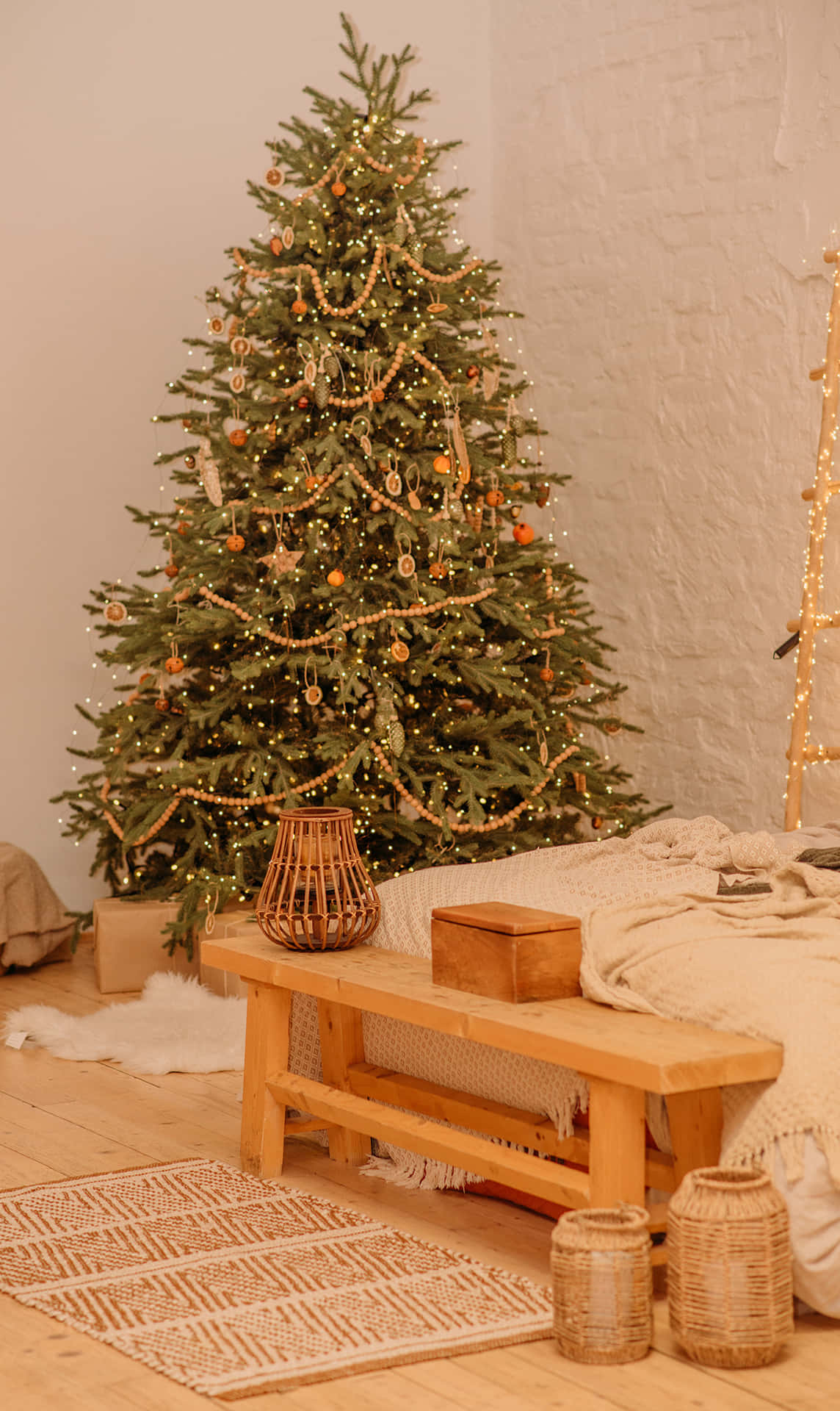 Simple Aesthetic Cute Christmas Tree Next To A Wooden Chair Background