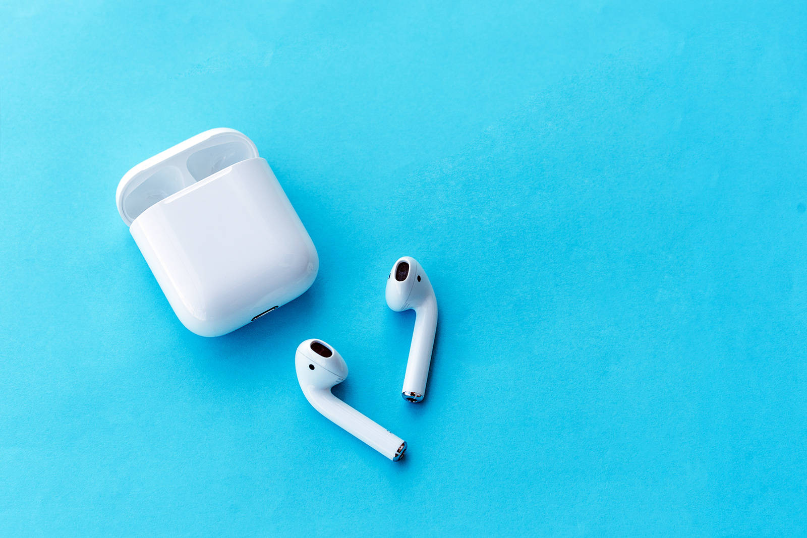 Simple Airpods In Blue Background