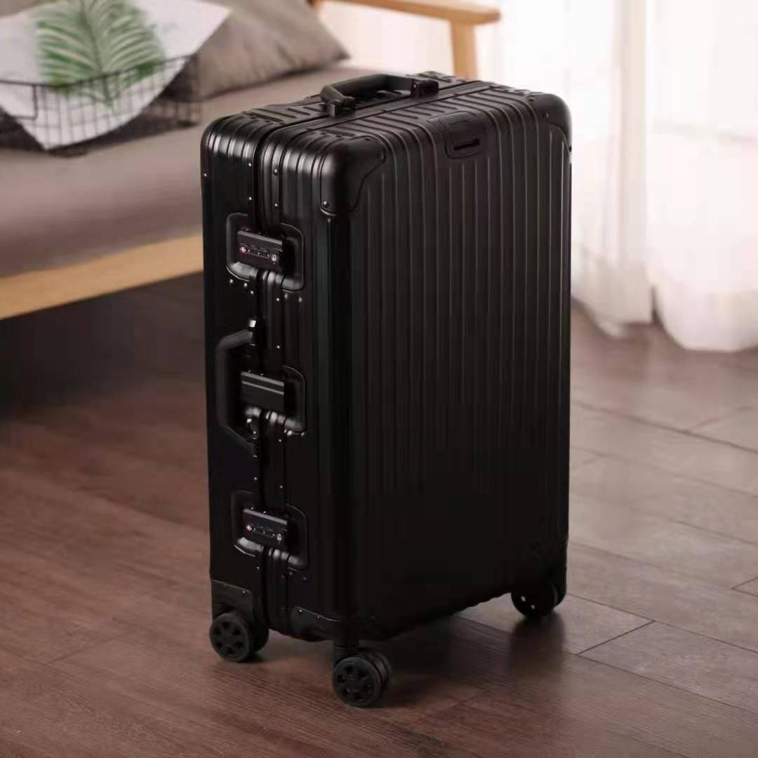 Simple Black Rimowa Suitcase Background