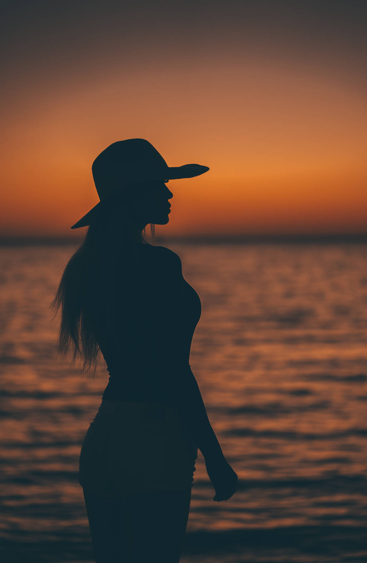 Simple Dark Aesthetic Woman Hat Sunset Background