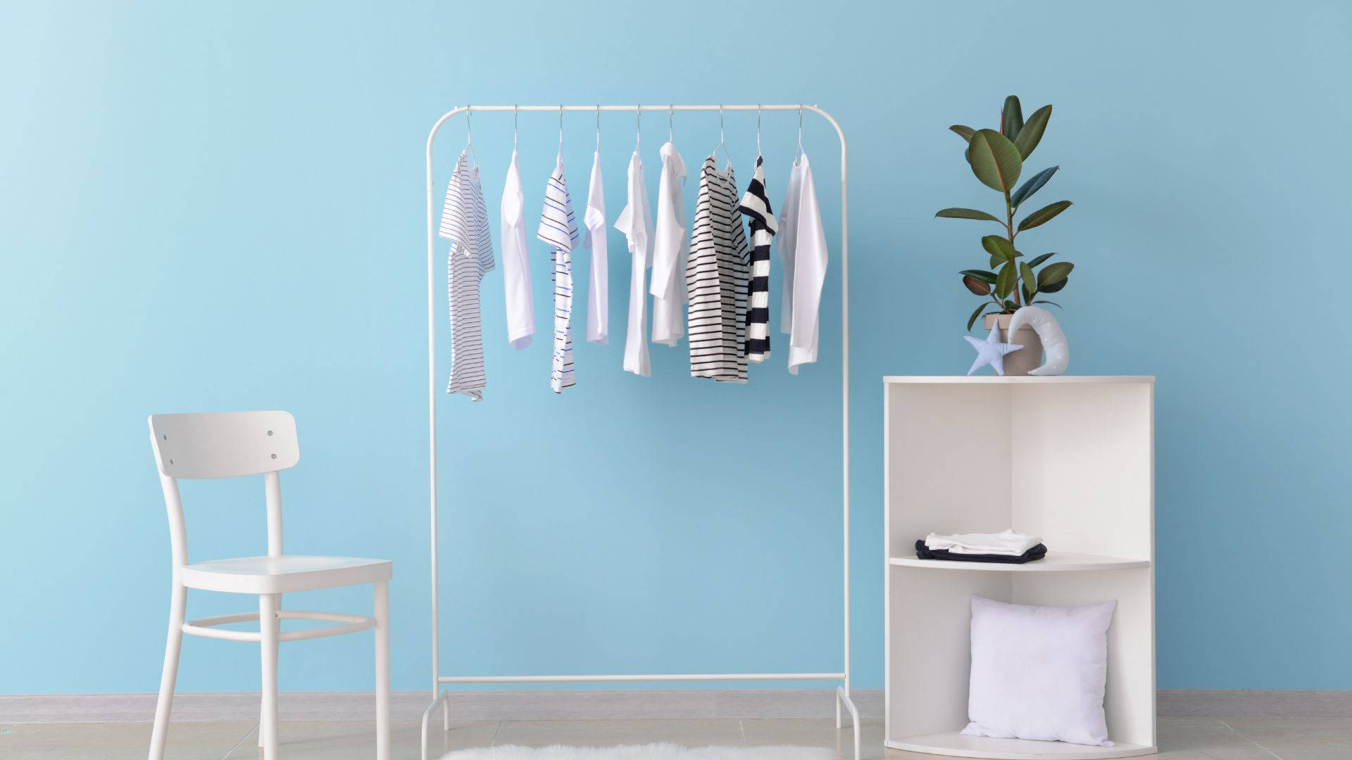 Simplistic Clothes Rack Furniture Background