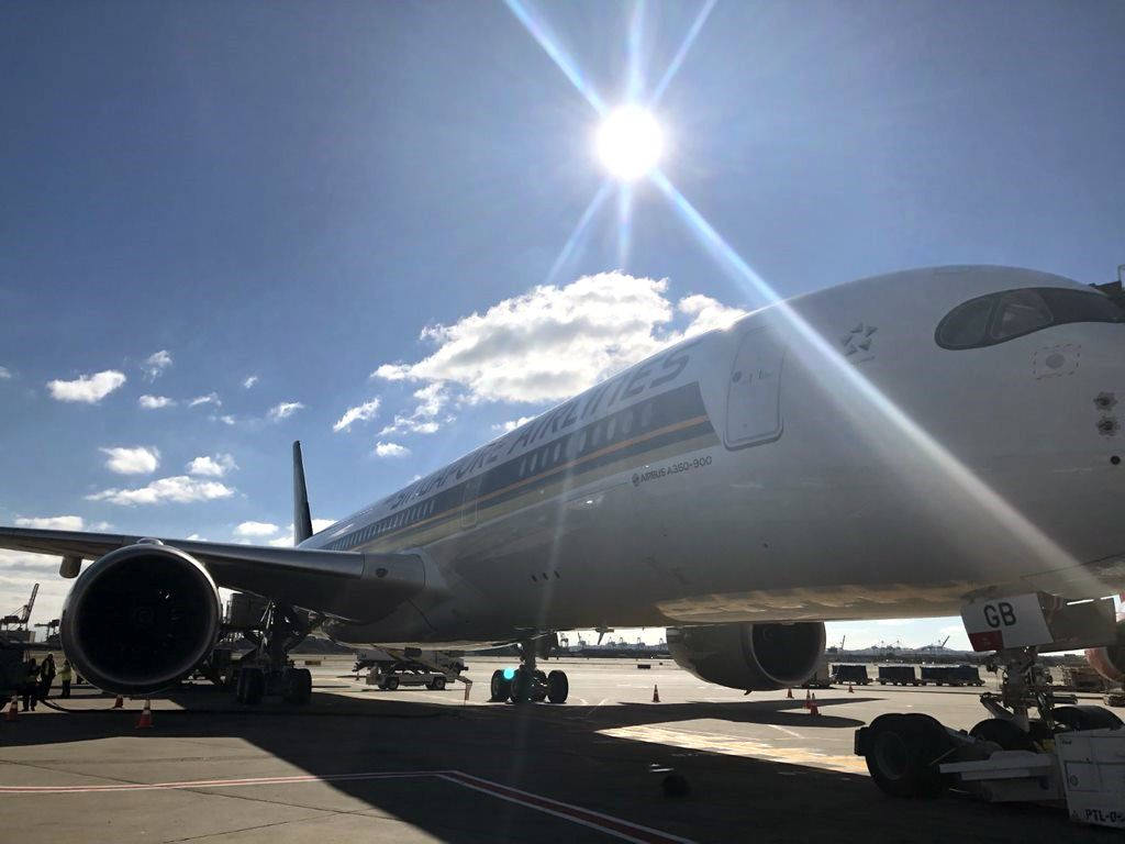 Singapore Airlines Taxiway Sun Background