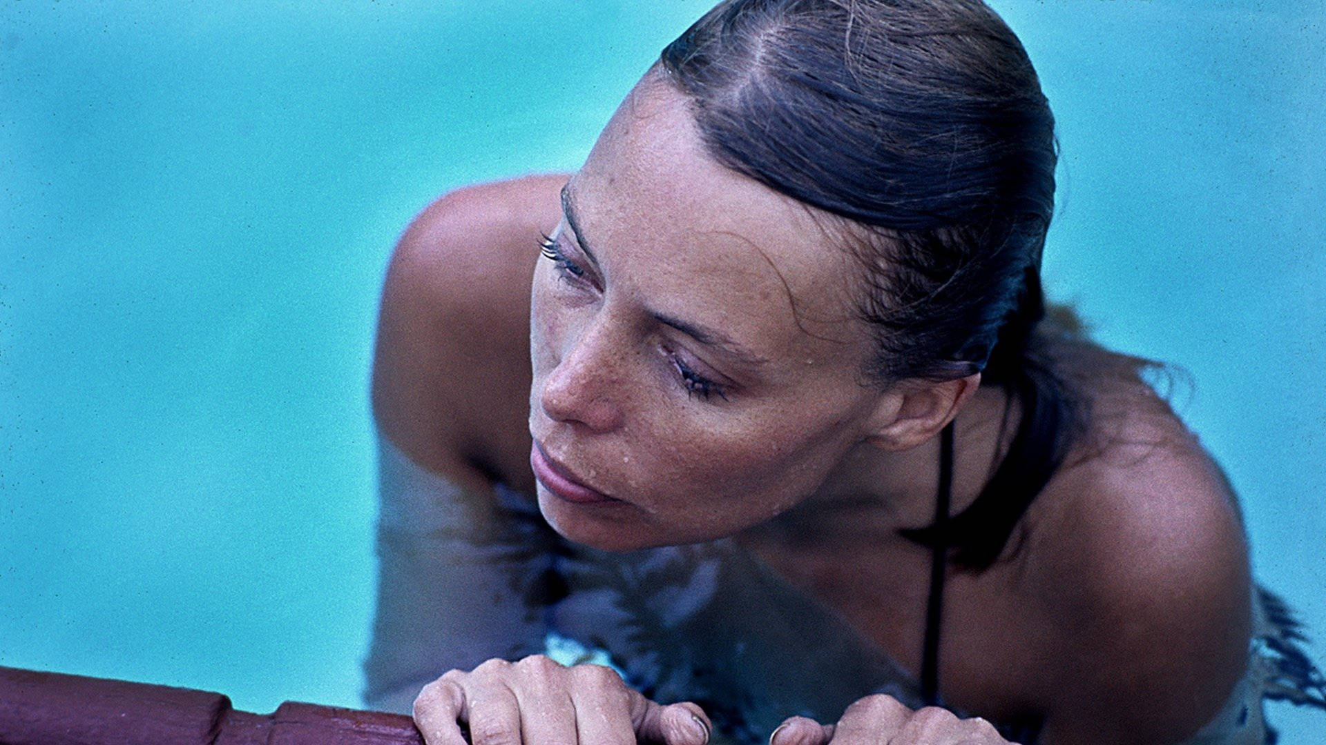 Singer And Painter Joni Mitchell Swimming Background