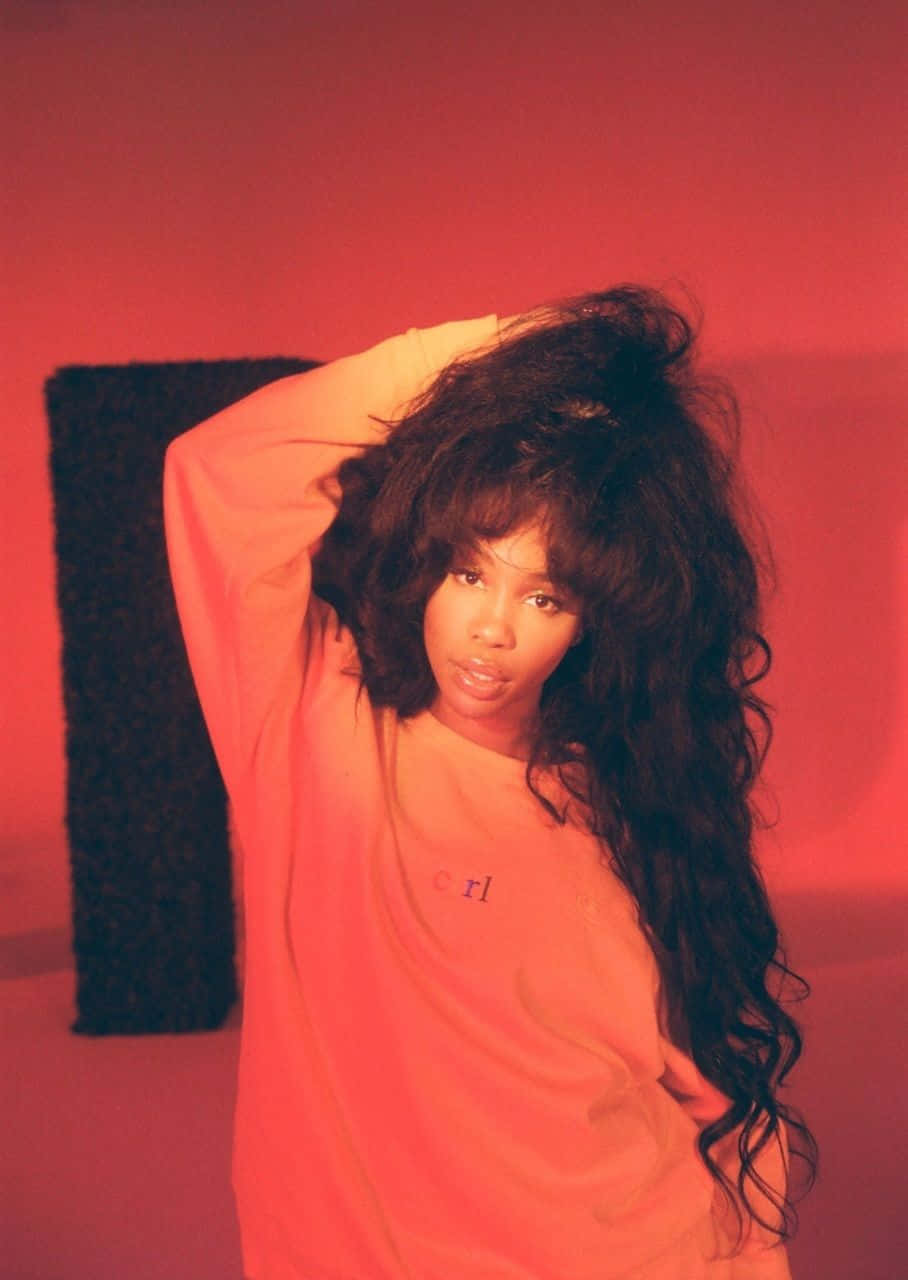 Singer And Record Producer Sza Looking Confident And Powerful Background