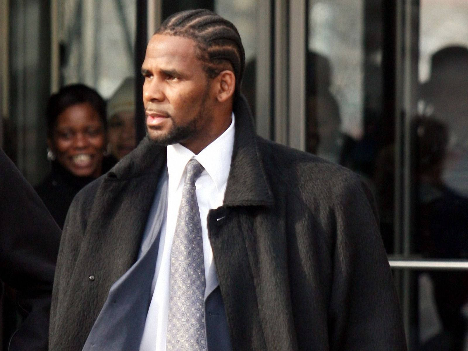 Singer R Kelly With Braided Hair Background