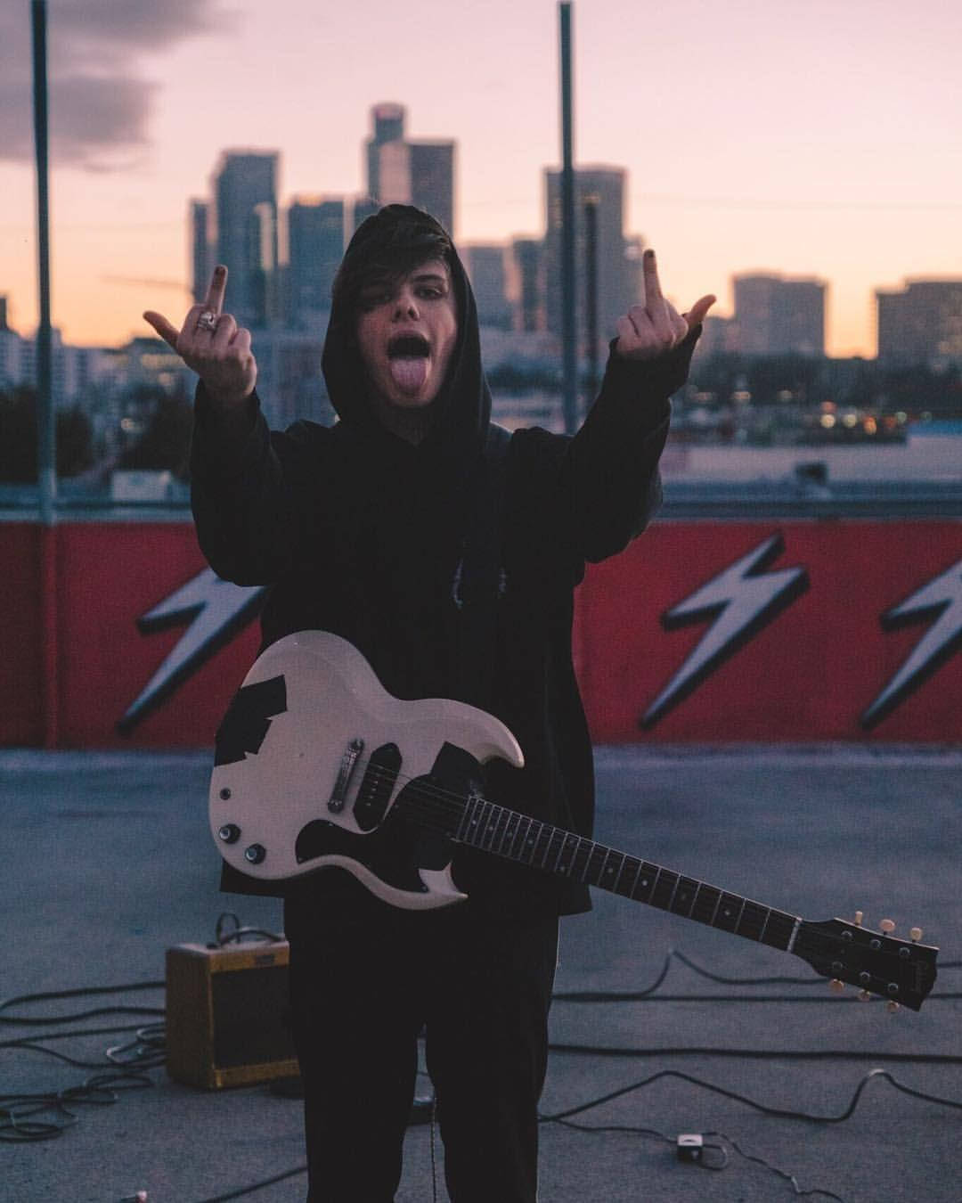 Singer-songwriter Yungblud Rocks The Stage At His Concert Background