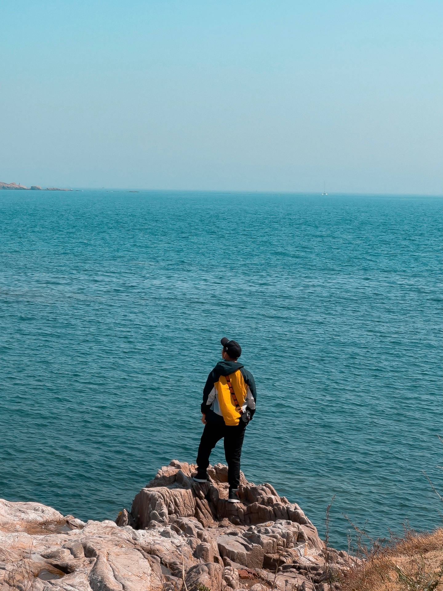 Single Boy In Blue Ocean