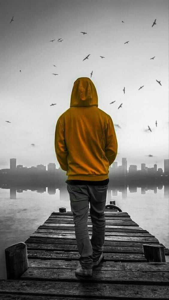 Single Boy In Yellow Hoodie Background