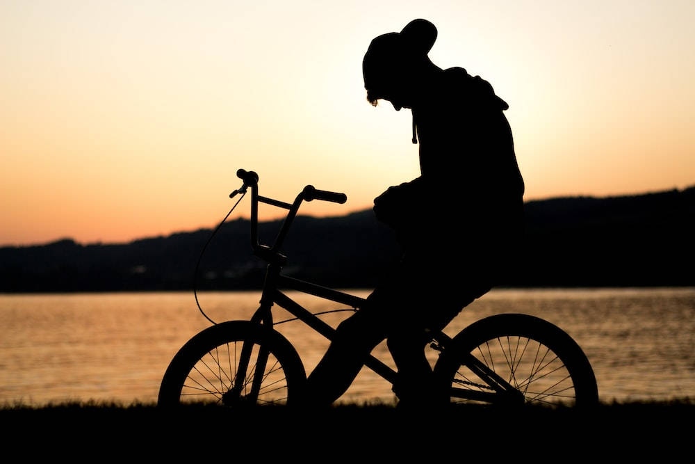 Single Boy Riding A Bike