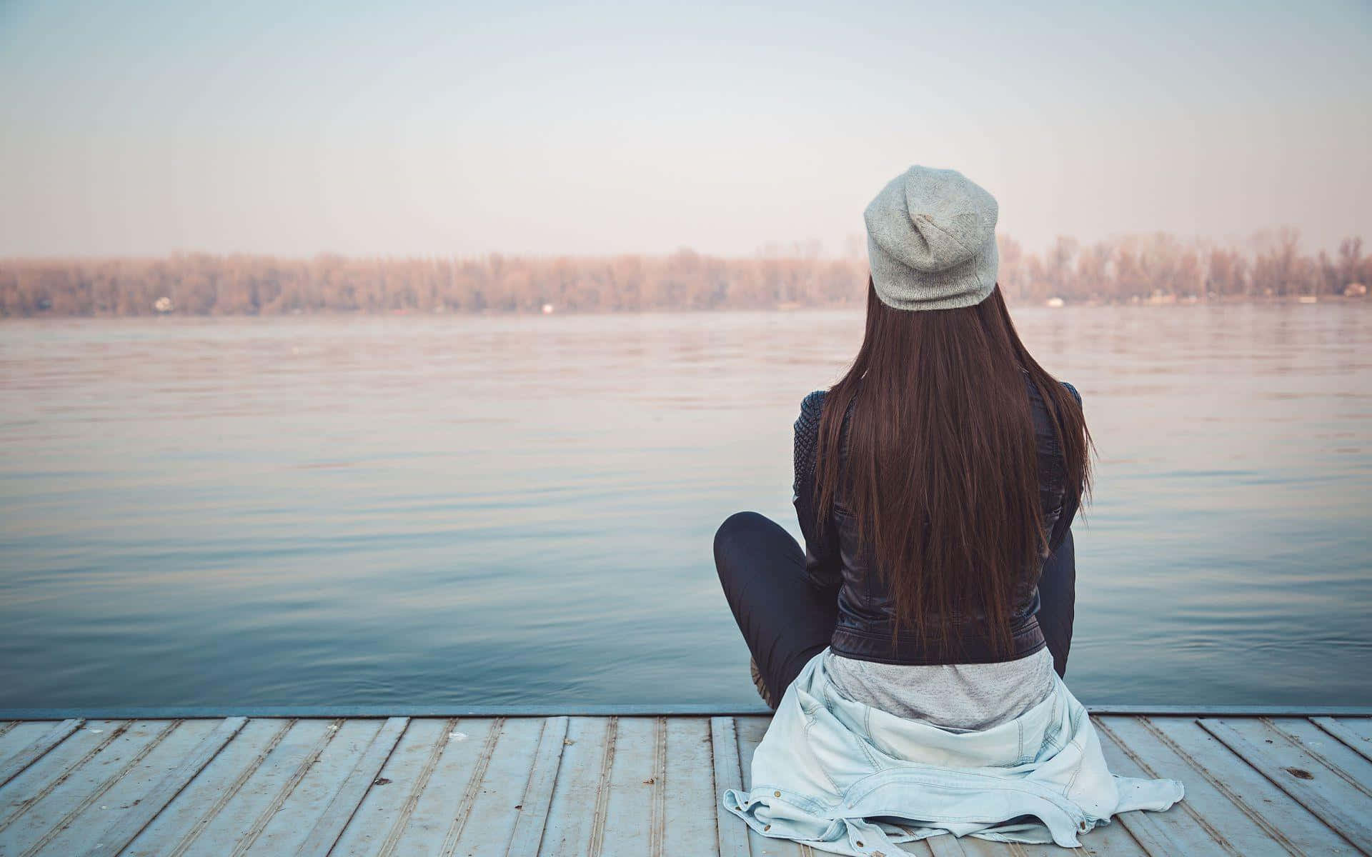 Single Woman On A Dock Background