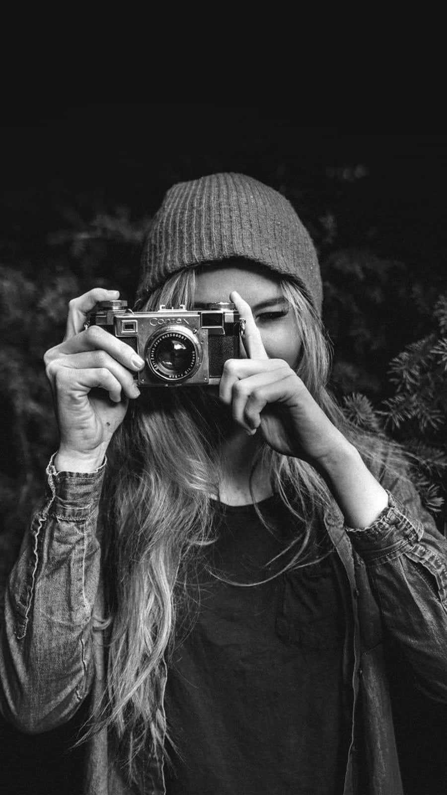 Single Woman With A Vintage Camera