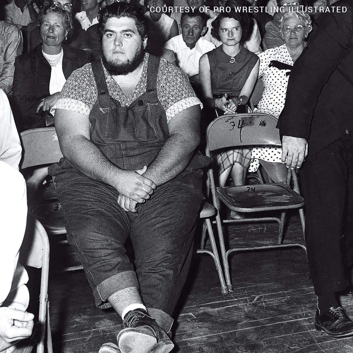Sitting American Professional Wrestler Haystacks Calhoun Background