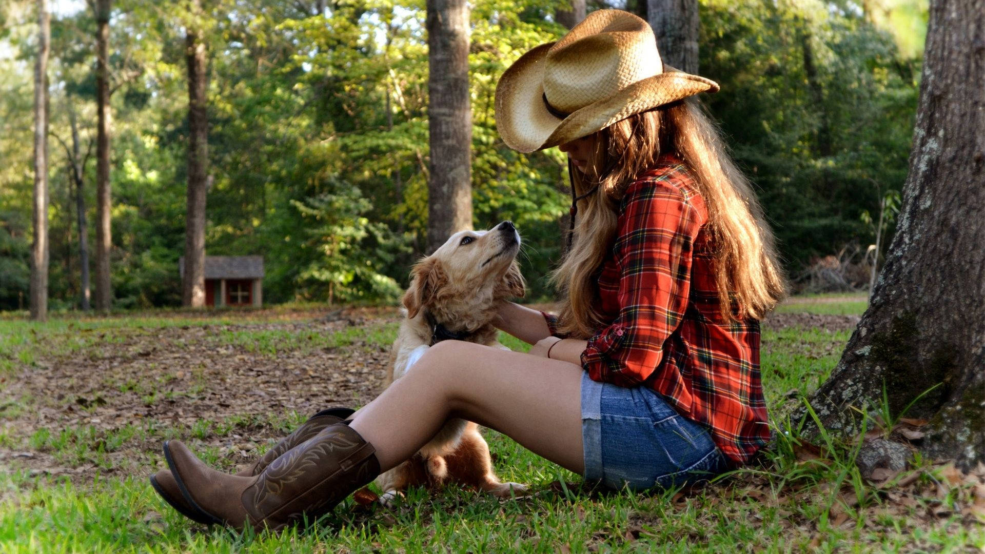 Sitting Cowgirl With A Dog Background