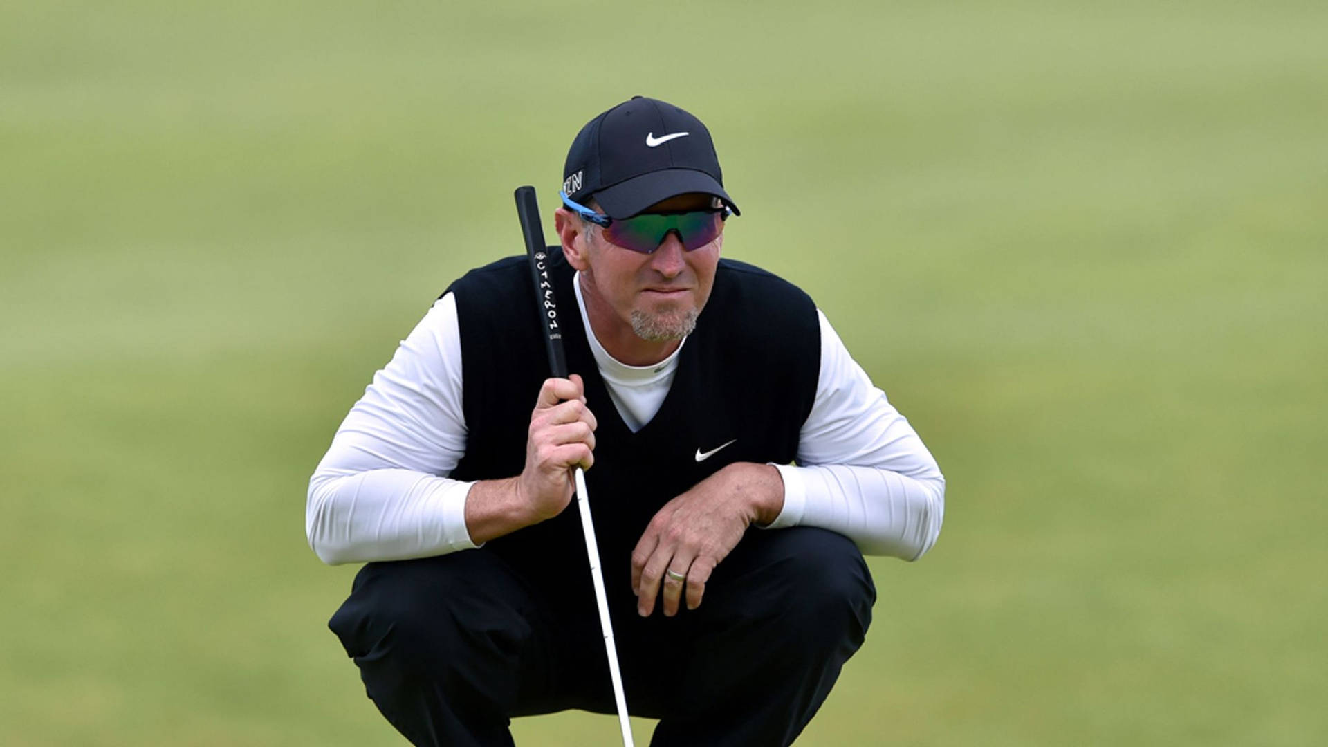 Sitting David Duval Looking At Afar Background