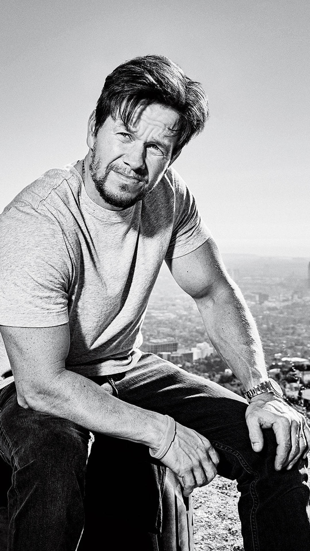 Sitting Mark Wahlberg In Black & White Background