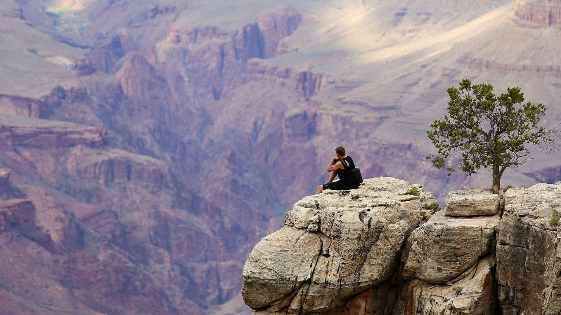 Sitting On A Mountain Top Hills Background