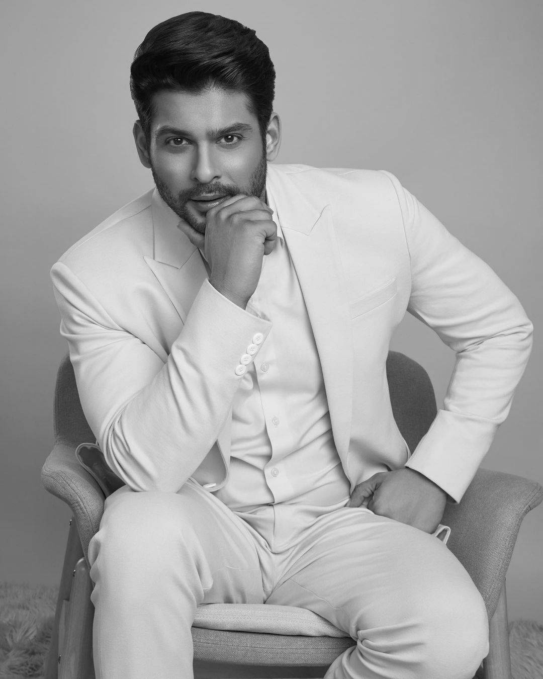 Sitting Sidharth Shukla Grayscale Background