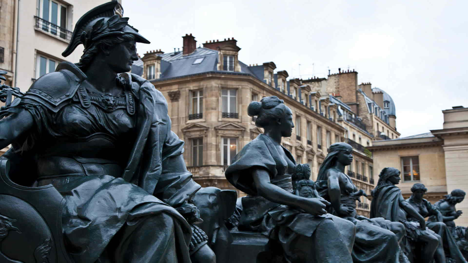 Six Continents Statues At Musée Dorsay Background