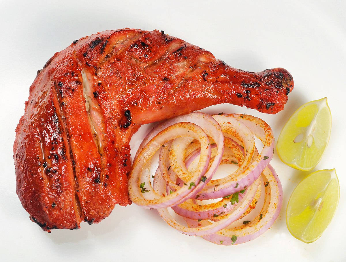 Sizzling Tandoori Chicken Thigh Background