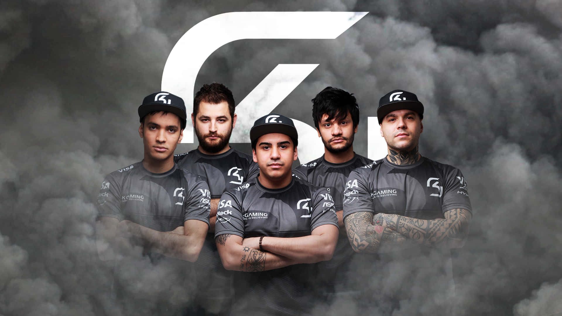Sk Gaming Team In Action On Stage Background