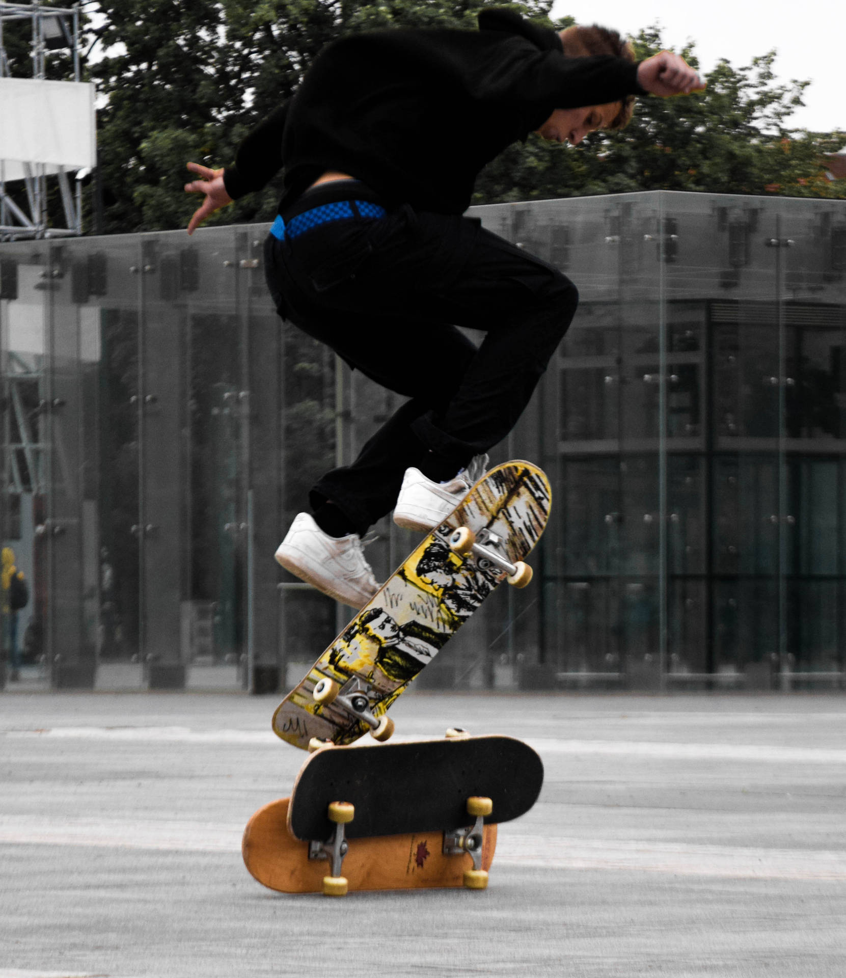 Skateboarder Mid-air Ollie Background