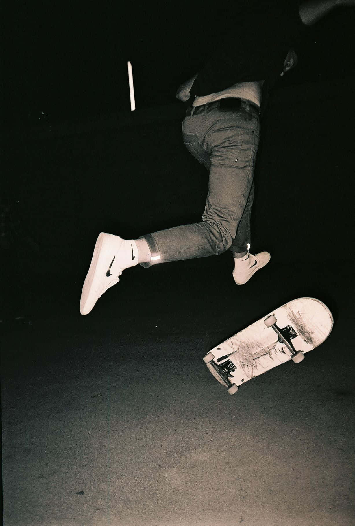 Skater Mid-jump In Action Background