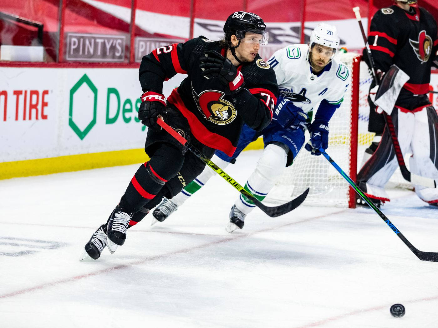 Skating And Racing Thomas Chabot Background